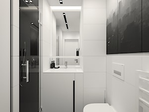 KRAKÓW, BOHATERÓW WRZEŚNIA - MIESZKANIE - Mała bez okna z lustrem z punktowym oświetleniem łazienka, styl minimalistyczny - zdjęcie od MIRAI STUDIO
