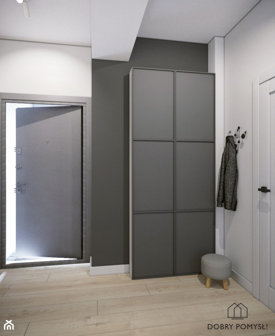 Mieszkanie na wynajem - Średni z wieszakiem czarny szary hol / przedpokój, styl skandynawski - zdjęcie od StudioDobryPomysł
