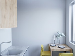 Mieszkanie na wynajem - Mała otwarta z kamiennym blatem szara z zabudowaną lodówką z nablatowym zlewozmywakiem kuchnia w kształcie litery l z oknem, styl skandynawski - zdjęcie od StudioDobryPomysł