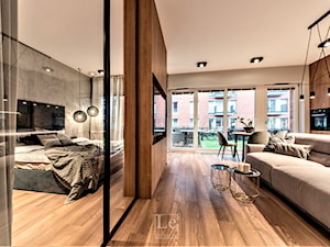 Projekt mieszkanie w Gdańsku - Stare Miasto - salon ściana szklana - zdjęcie od Le-DESIGN