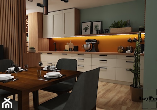 Salon z kuchnią (wersja pierwsza) - Średnia otwarta z salonem pomarańczowa zielona z zabudowaną lodówką z nablatowym zlewozmywakiem kuchnia jednorzędowa, styl nowoczesny - zdjęcie od IZZY PROJEKT