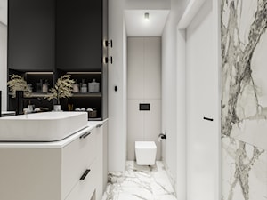 Niewielka elegancka i nowoczesna łazienka w marmurach - zdjęcie od polymetricstudio