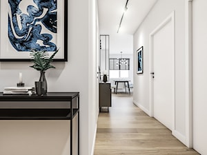 Długi korytarz w mieszkaniu - zdjęcie od polymetricstudio
