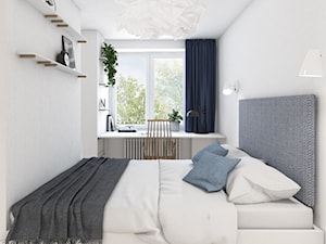 Mieszkanie typu studio - Mała biała z biurkiem sypialnia, styl minimalistyczny - zdjęcie od ZKA architekci