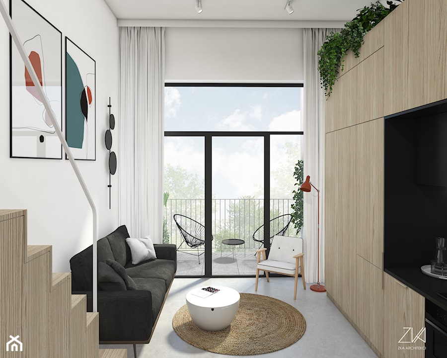 Mikromieszkanie z antresolą - Mały biały salon z kuchnią z tarasem / balkonem, styl minimalistyczny - zdjęcie od ZKA architekci