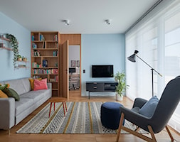 Mieszkanie w Krakowie - Średni niebieski salon z bibiloteczką, styl nowoczesny - zdjęcie od Paweł Maj - Homebook