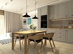 Między czernią a bielą - Średnia otwarta z salonem biała szara z zabudowaną lodówką kuchnia, styl nowoczesny - zdjęcie od M!kaDesign