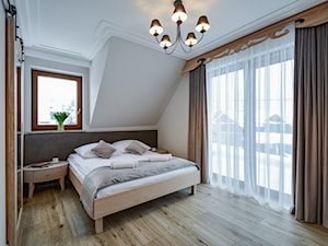 przykładowy pokój w pensjonacie "Szczawniczanka" - zdjęcie od PERIHDESIGN