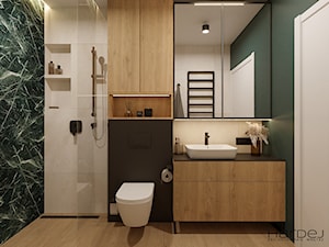 Zielone i jasnobeżowe płytki, szafki laminat drewnopodobny, czarny blat, czarna armatura w łazience - zdjęcie od Monika Hardej Architekt