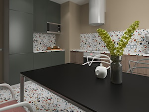 SPB - Średnia otwarta z salonem z kamiennym blatem biała pomarańczowa z zabudowaną lodówką z podblatowym zlewozmywakiem kuchnia dwurzędowa, styl nowoczesny - zdjęcie od yasyasemenets