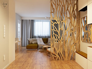 Ażurowa ściana w korytarzu oddzielająca hol od salonu - zdjęcie od Echaust Design - Studio Projektowania Wnętrz