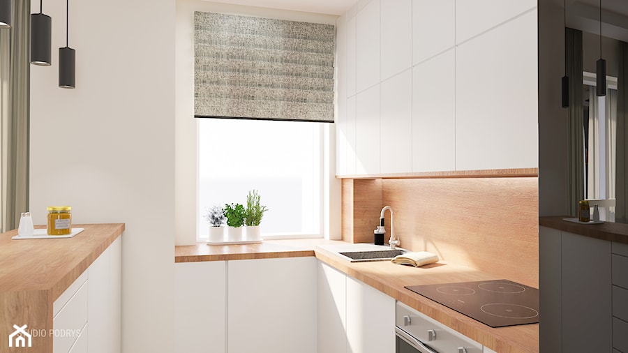 Projekt mieszkania w Poznaniu - Średnia otwarta biała z zabudowaną lodówką z nablatowym zlewozmywakiem kuchnia w kształcie litery u z oknem, styl nowoczesny - zdjęcie od STUDIO PODRYS