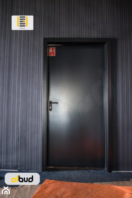 Nowoczesne drzwi stalowe płaszczowe ECO Wiśniowski - zdjęcie od OLBUD OGRODZENIA BRAMY DRZWI I OKNA STRASZYN - Homebook