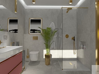 łazienka z złotymi akcentami