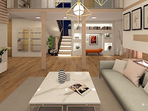 Salon ze skośnym sufitem i kominkiem - zdjęcie od SYSdesign