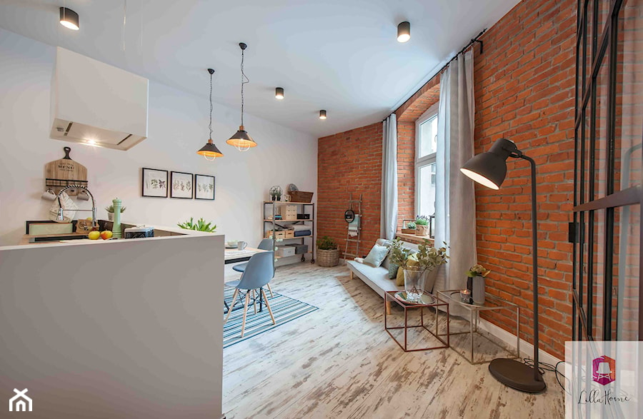 Salon mieszkania w kamienicy w stylu scandi loft - zdjęcie od Lilla Home