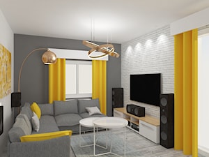 Jasny salon z mocnymi żółtymi dodatkami - zdjęcie od Studio prosta forma