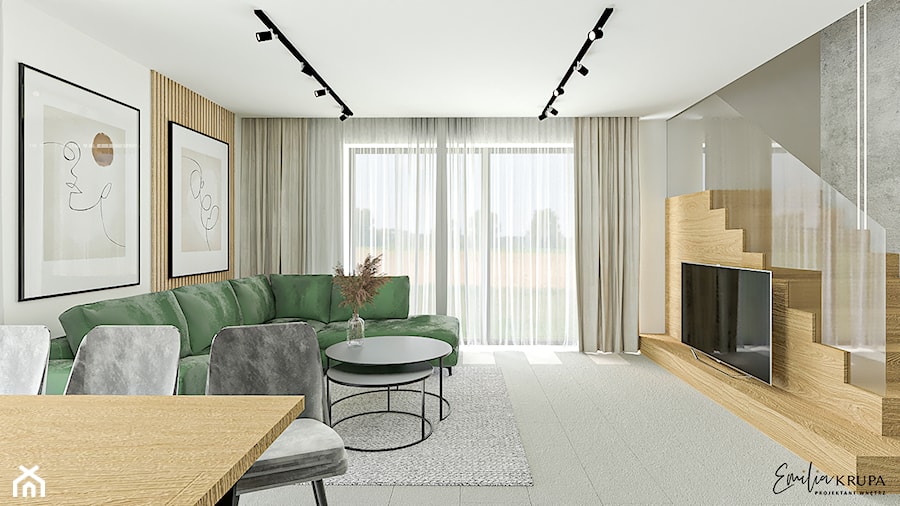Salon z otwartą kuchnią w nowoczesnym domu, zielona sofa - zdjęcie od Emilia Krupa Projektant Wnetrz