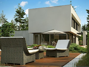 Zx130 - Duży z podłogą z desek z meblami ogrodowymi taras z tyłu domu, styl nowoczesny - zdjęcie od Z500