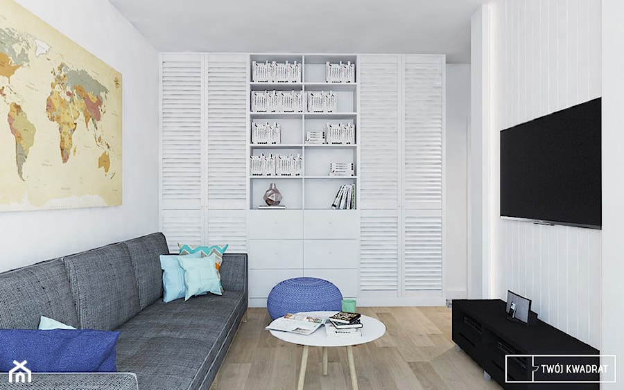 mieszkanie w Warszawie - Mały biały salon z bibiloteczką, styl skandynawski - zdjęcie od Twój Kwadrat
