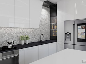 biały apartament - Średnia zamknięta z kamiennym blatem szara z zabudowaną lodówką z nablatowym zlewozmywakiem kuchnia w kształcie litery l z wyspą lub półwyspem z oknem, styl nowoczesny - zdjęcie od Twój Kwadrat