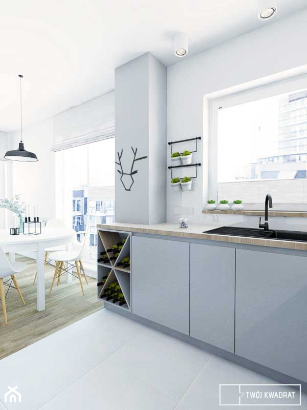 mieszkanie w Warszawie - Mała otwarta biała kuchnia jednorzędowa z oknem, styl skandynawski - zdjęcie od Twój Kwadrat