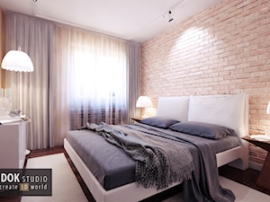 Sypialnia ze ścianą z cegły