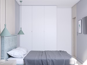 Sypialnia z zielonym tapicerowanym łóżkiem. - zdjęcie od VISO Pracownia Projektowa