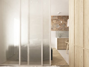 Wydzielona sypialnia za drzwiami z mlecznego szkła - zdjęcie od Checza studio projektowe