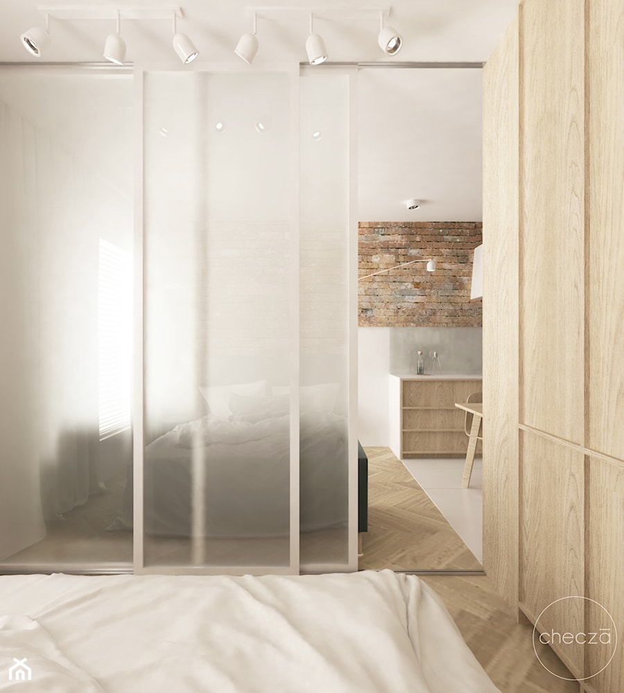 Wydzielona sypialnia za drzwiami z mlecznego szkła - zdjęcie od Checza studio projektowe