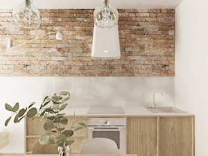 kuchnia ze ścianą wykończoną cegłą rozbiórkową - zdjęcie od Checza studio projektowe