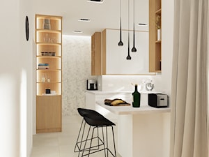 Salon z kuchnią w jasnych kolorach - Kuchnia - zdjęcie od Armonia Eko Wnętrza