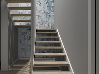 Drewniane schody z elementami bieli w domu jednorodzinnym pod Bydgoszczą