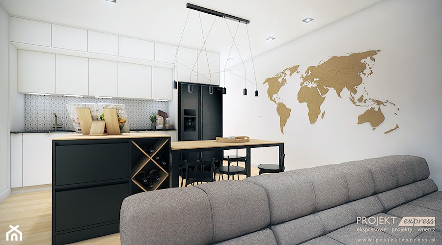 Salon z aneksem kuchennym i korkową mapą świata na ścianie - 24 mkw - zdjęcie od PROJEKT express