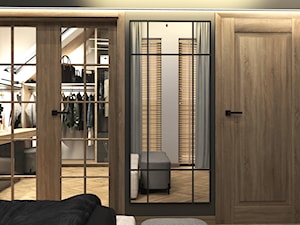 Garderoba za dwuskrzydłowymi drzwiami - zdjęcie od Projektowanie wnętrz Dobry Plan