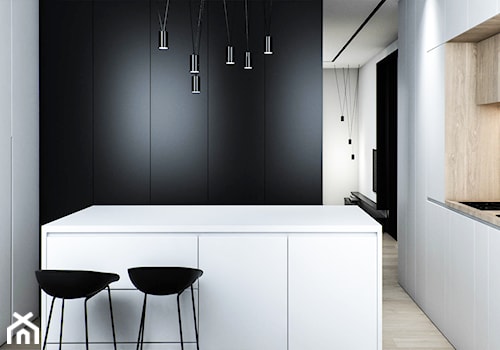 Mieszkanie w Łodzi - Mała otwarta z kamiennym blatem biała czarna z zabudowaną lodówką kuchnia w kształcie litery u z wyspą lub półwyspem, styl minimalistyczny - zdjęcie od OSOM.
