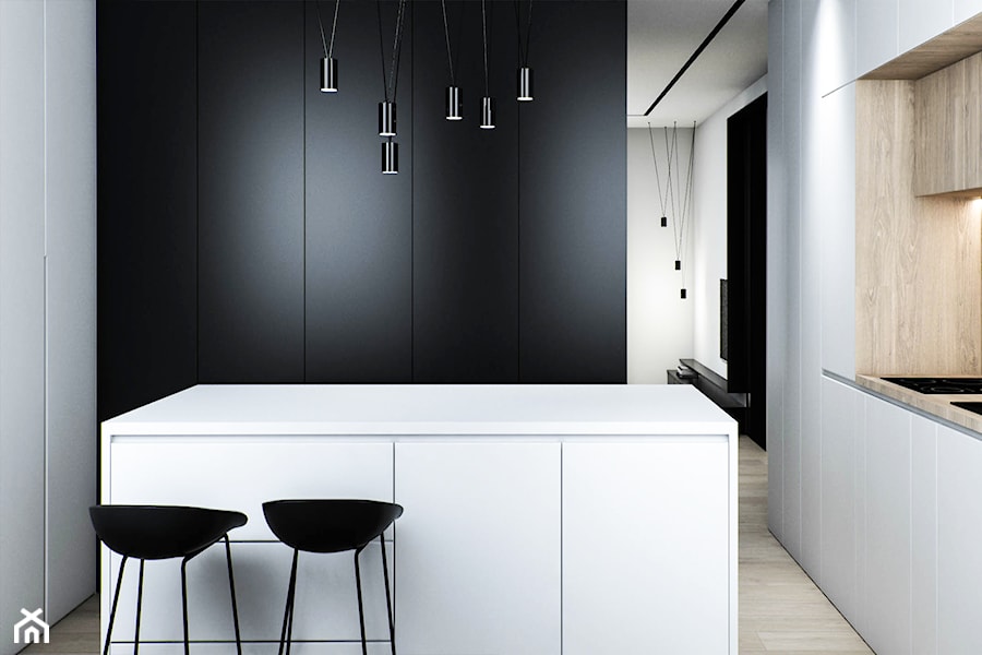 Mieszkanie w Łodzi - Mała otwarta z kamiennym blatem biała czarna z zabudowaną lodówką kuchnia w kształcie litery u z wyspą lub półwyspem, styl minimalistyczny - zdjęcie od OSOM.