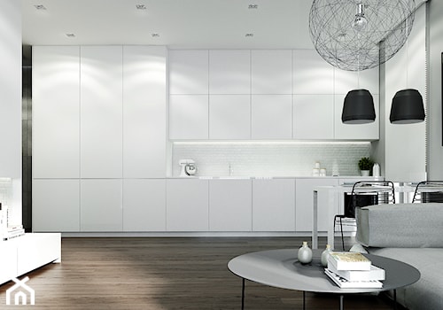 WORONICZA - Średnia otwarta z salonem biała z zabudowaną lodówką kuchnia jednorzędowa, styl minimalistyczny - zdjęcie od KAEL Architekci