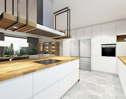 dom w Żorach - Duża otwarta z salonem biała z zabudowaną lodówką kuchnia w kształcie litery l z wysp ... - zdjęcie od nanoSTUDIO - Homebook