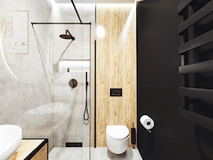 Nowoczesna łazienka z czarną scianą - zdjęcie od Qualita Interno