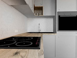 Salon z kuchnią i aneksem sypialnym - Kuchnia, styl nowoczesny - zdjęcie od M.PROJEKTOWNIA