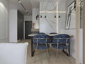 Wydzielona strefa jadalniana w mieszkaniu w Zabrzu - zdjęcie od STUDIO MILIMETR
