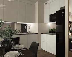 Widok na białą minimalistyczną kuchnię - zdjęcie od POKORA - Projektowanie wnętrz - Homebook