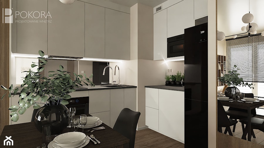Widok na białą minimalistyczną kuchnię - zdjęcie od POKORA - Projektowanie wnętrz