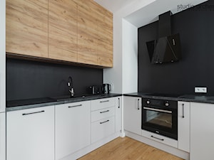Apartament z zielonym akcentem - Kuchnia, styl minimalistyczny - zdjęcie od Studio Archemia