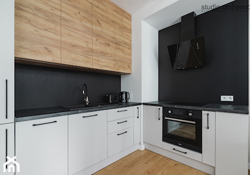 Apartament z zielonym akcentem - Kuchnia, styl minimalistyczny - zdjęcie od Studio Archemia
