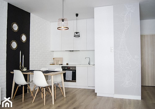 Apartament 4 Żagiel Gdańsk - Mała otwarta z salonem biała z zabudowaną lodówką z nablatowym zlewozmywakiem kuchnia jednorzędowa z kompozytem na ścianie nad blatem kuchennym, styl skandynawski - zdjęcie od Agata Paczuska-Bałkowiec