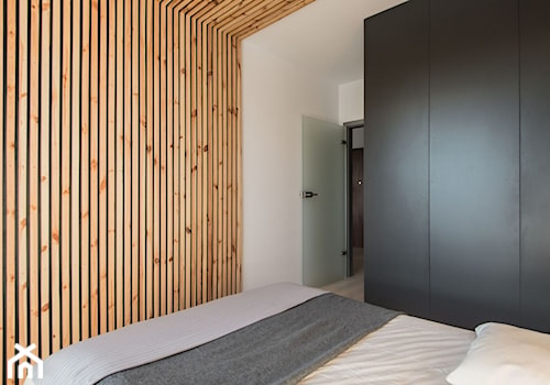 Realizacja Nowoczesny Minimalizm - Średnia biała czarna sypialnia - zdjęcie od DISENO INTERIORS - Apartamenty PREMIUM