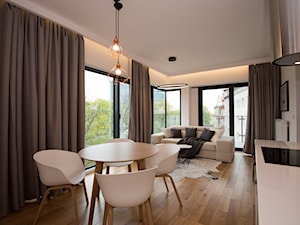 Realizacja Apartamentu z widokiem na Park - Średni biały salon z kuchnią z jadalnią - zdjęcie od DISENO INTERIORS - Apartamenty PREMIUM