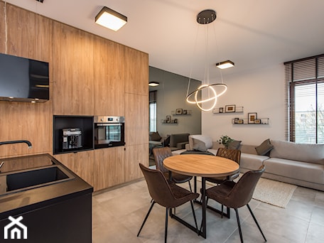 Aranżacje wnętrz - Jadalnia: Realizacja - Apartament przy Parku - Mała biała szara jadalnia w salonie w kuchni - DISENO INTERIORS - Apartamenty PREMIUM. Przeglądaj, dodawaj i zapisuj najlepsze zdjęcia, pomysły i inspiracje designerskie. W bazie mamy już prawie milion fotografii!